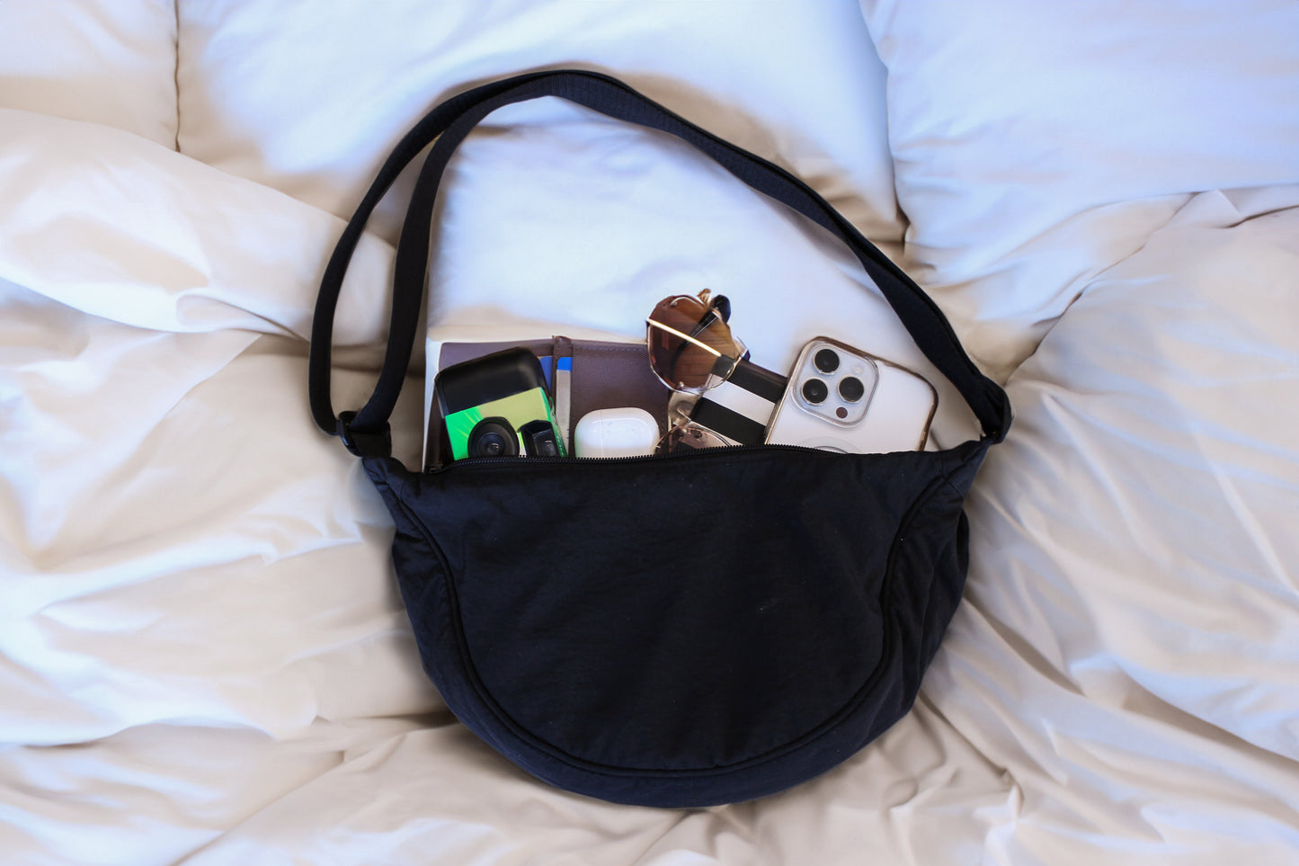Traveler's Everyday Shoulder Bag with accessories and daily essentials